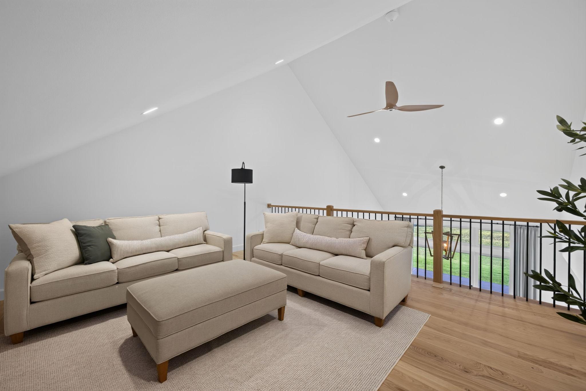 29 Upper Level Loft with Open Great Room Views.jpg