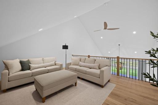29 Upper Level Loft with Open Great Room Views.jpg