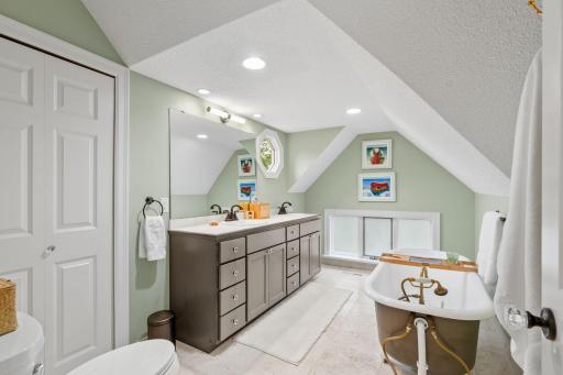 Upper level full bathroom with delightful soaking tub and separate shower. Completely renovated a few years ago, this is the spa-like relaxation oasis you have been waiting for!
