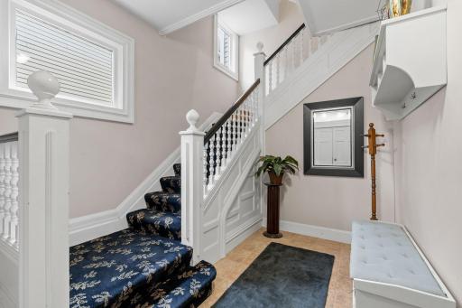 From the moment you step inside, you'll find the extraordinary finishes and craftsmanship. Pictured here is the grand staircase leading to 408 Laurel Avenue from inside the main level lobby.