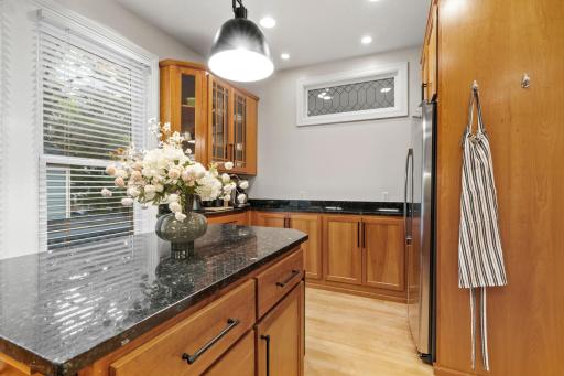 Stunning gourmet kitchen featuring abundant cabinet space