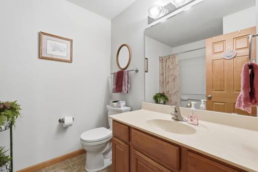 Upper level full bath with tub/shower combination conveniently serves guests and additional living space.