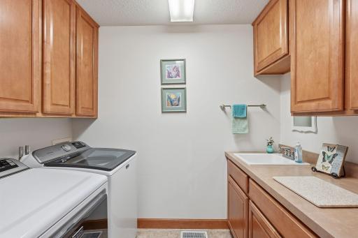 Convenient main level laundry with brand new washer and dryer.
