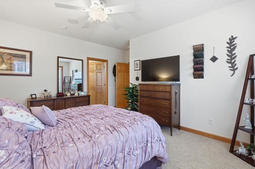 Generous main-level primary suite designed for comfortable everyday living.