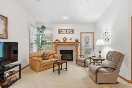 Living room offers direct access to the patio and peaceful outdoor setting.