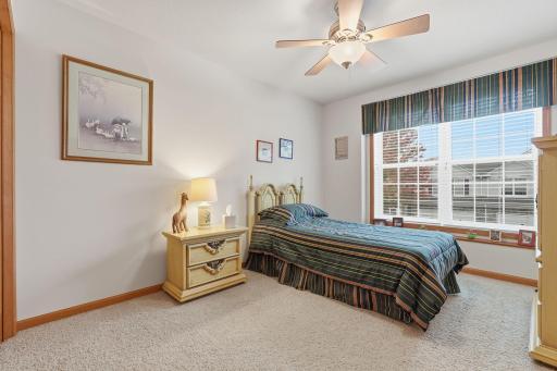 Spacious upper-level second bedroom with ample closet space.