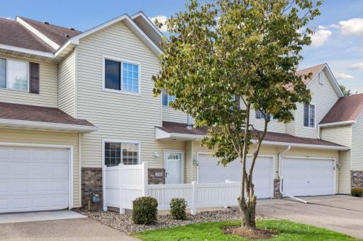 Enjoy your private outdoor retreat with a cozy fenced-in patio, perfect for relaxing or entertaining.