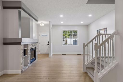 Stunning new flooring flows throughout the entire home, adding a stylish and cohesive touch to every room.