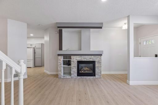 This wonderful gas fireplace adds both style and warmth to the heart of the home.
