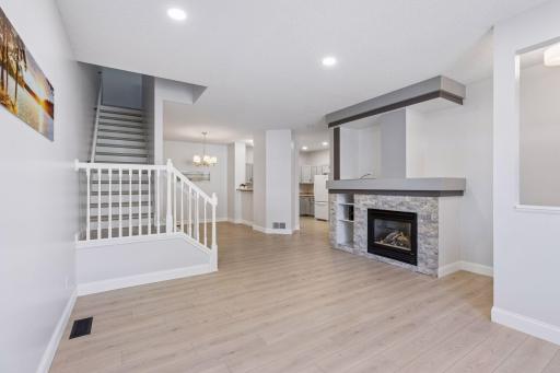 The seamless flow from the living room into the kitchen makes this home perfect for entertaining and everyday living.
