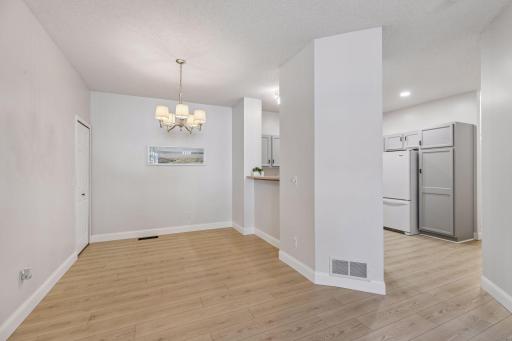 There is plenty of room for seating, whether at the dining table or the spacious kitchen island.