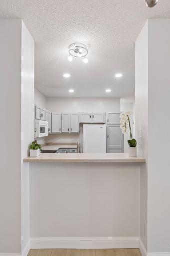 The main floor boasts a spacious open-concept design, making the home feel even more inviting.