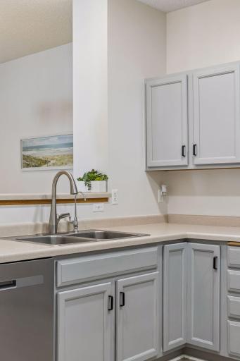 The kitchen sink overlooks the dining room, allowing for a connected and open feel throughout the main level.