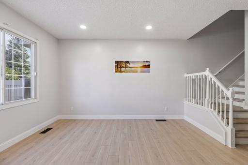 The spacious living room offers plenty of room to relax, entertain, and enjoy everyday living.