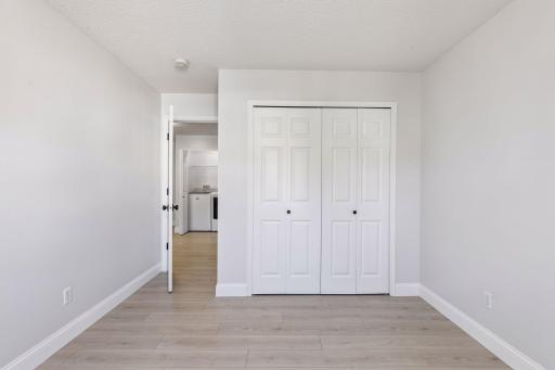 The second upstairs bedroom is bright, spacious, and offers plenty of versatility.
