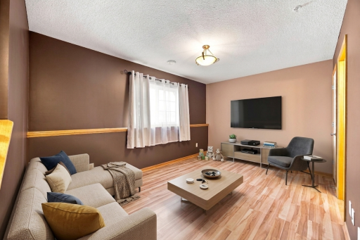 AI virtually staged lower level family room