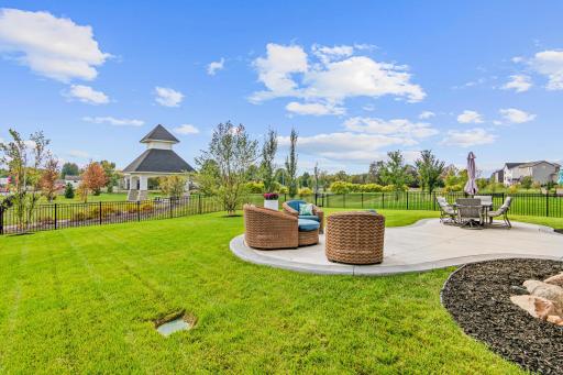 Amazing backyard! fully landscaped with sprinkler system, concrete patio and fully enclosed fence.