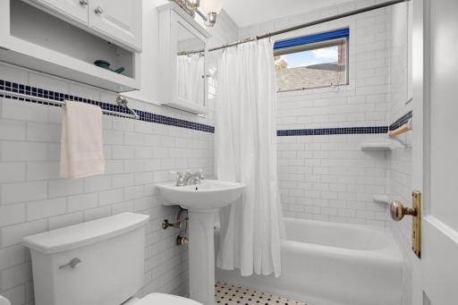 Bathroom tile updated to fit the character of the home