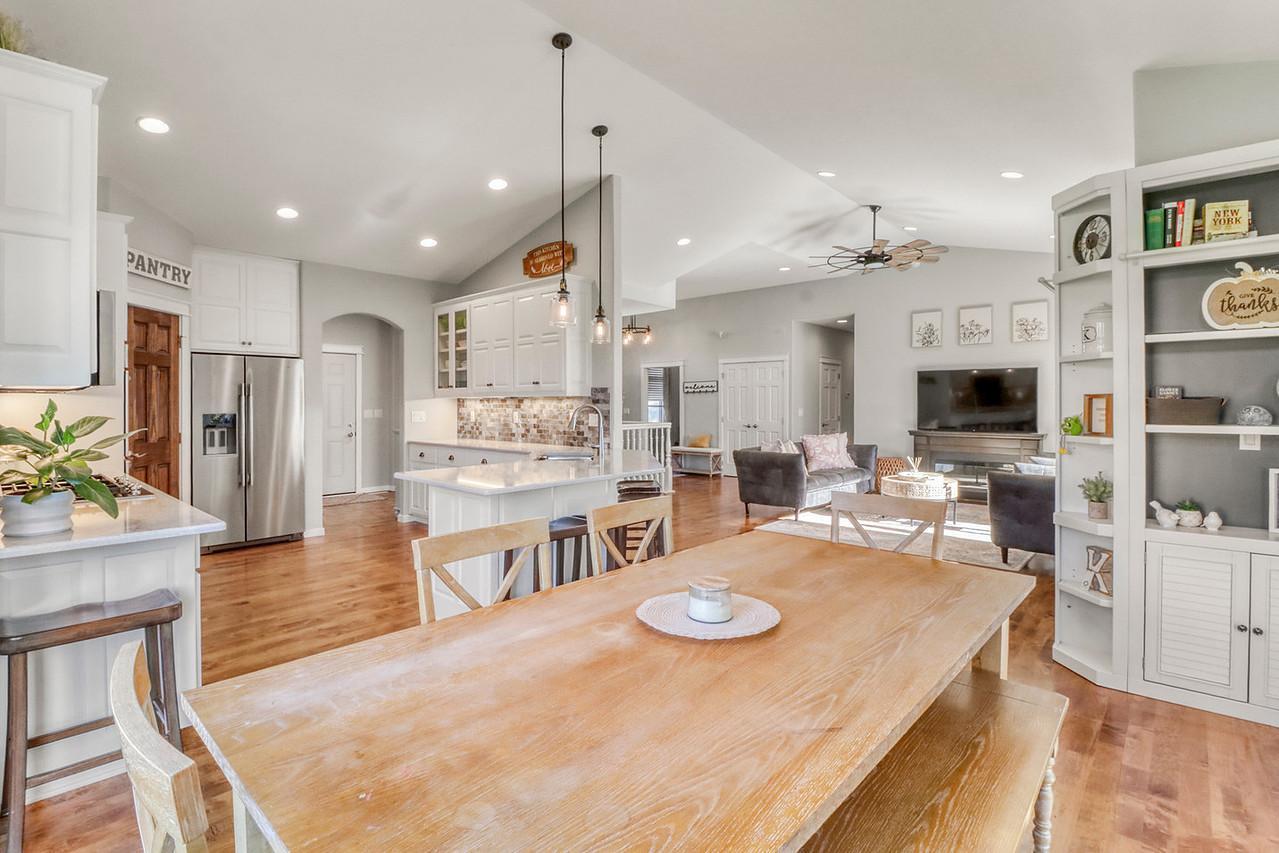 Dining w/ view of living room/ kitchen