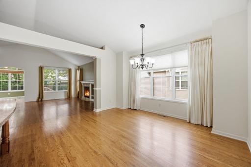 Seamless flow from kitchen, to dining, to living space.