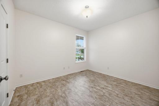 Second bedroom on main level. Could be used as a bedroom, office, or hobby room.