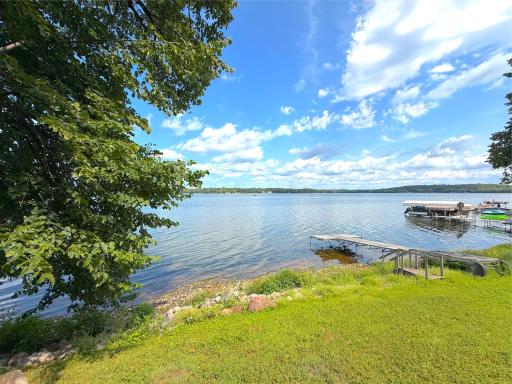 Spacious lakeside lawn offers plenty of room to relax, play and entertain, with wonderful views and easy access to the shoreline.