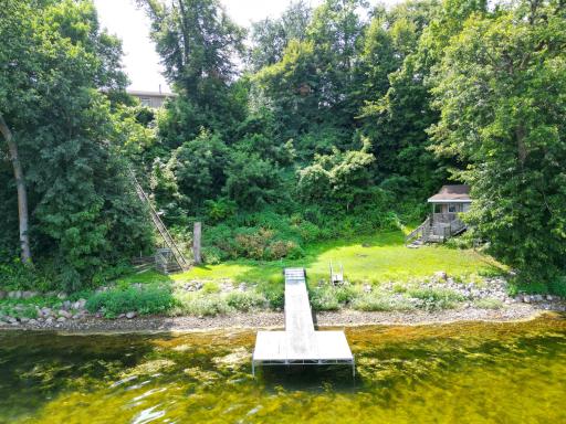 Spend your days by the lake with the convenience of a hillside elevator system leading to the expansive shoreline yard and shore-house.