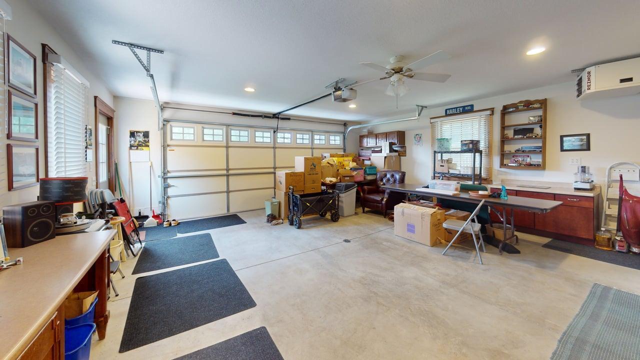 More than just parking, the attached double garage features abundant space, built-in cabinetry and room for hobbies, projects and storage.
