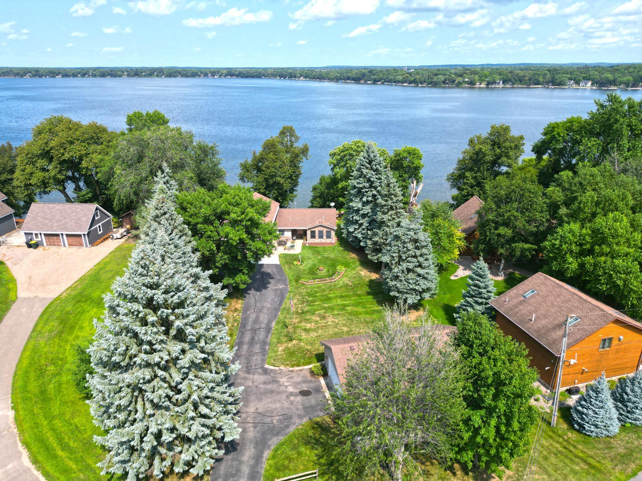 Enjoy year-round lake living on the shores of beautiful Clearwater Lake offering plenty of space to gather and entertain.