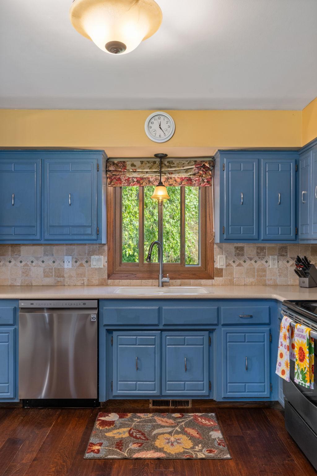 Kitchen Window Looks to Wooded Backyard