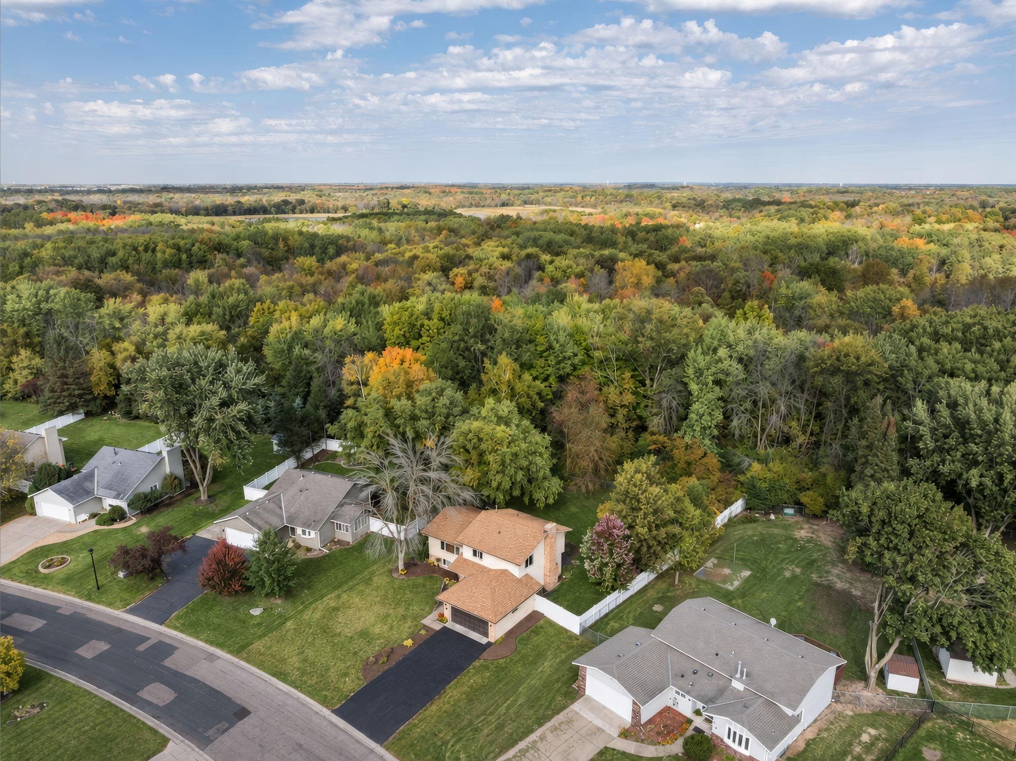 Backs to Elm Creek Park