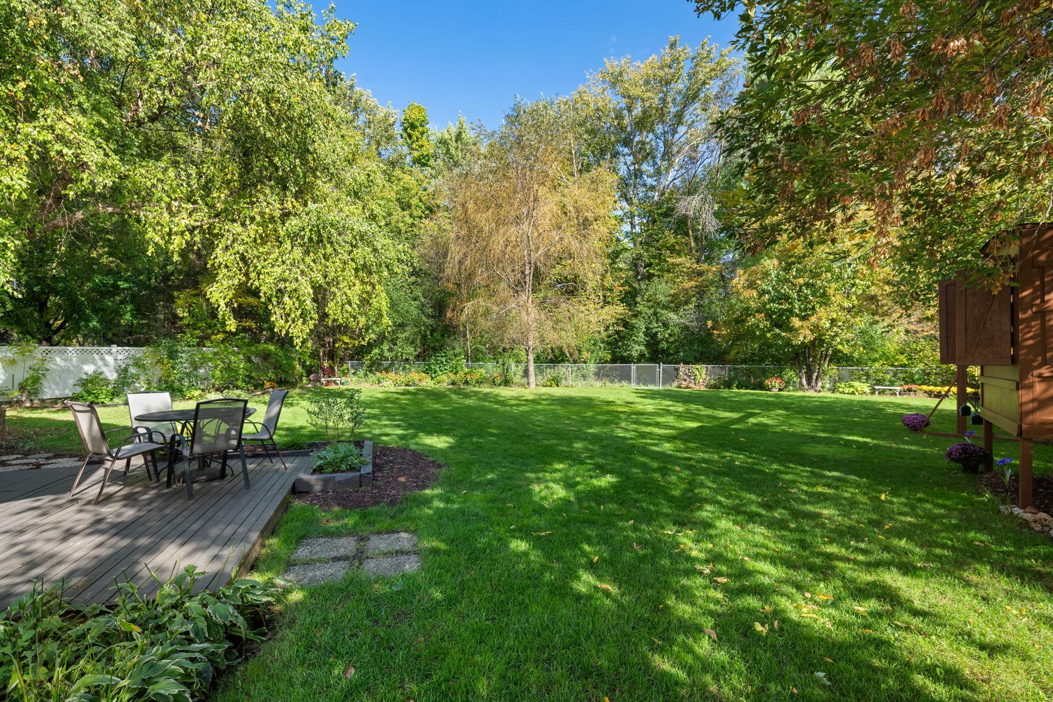 Spacious Backyard with gate to Elm Creek Trails