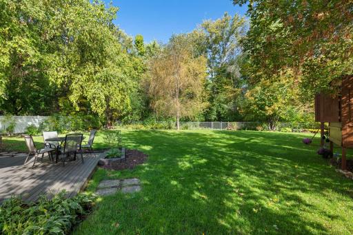 Spacious Backyard with gate to Elm Creek Trails