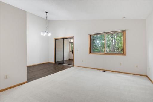Living room looking at the dining area with Nice laminate flooring