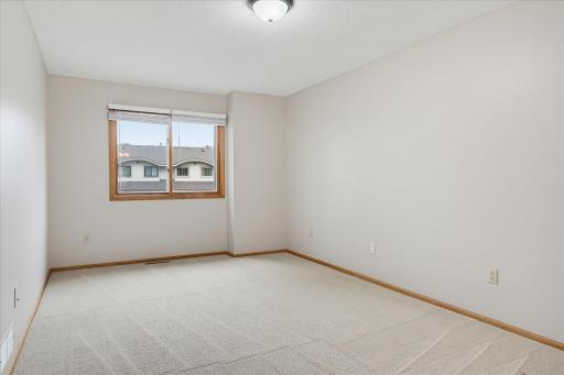 Primary bedroom is very nice size, all freshly painted including the ceiling