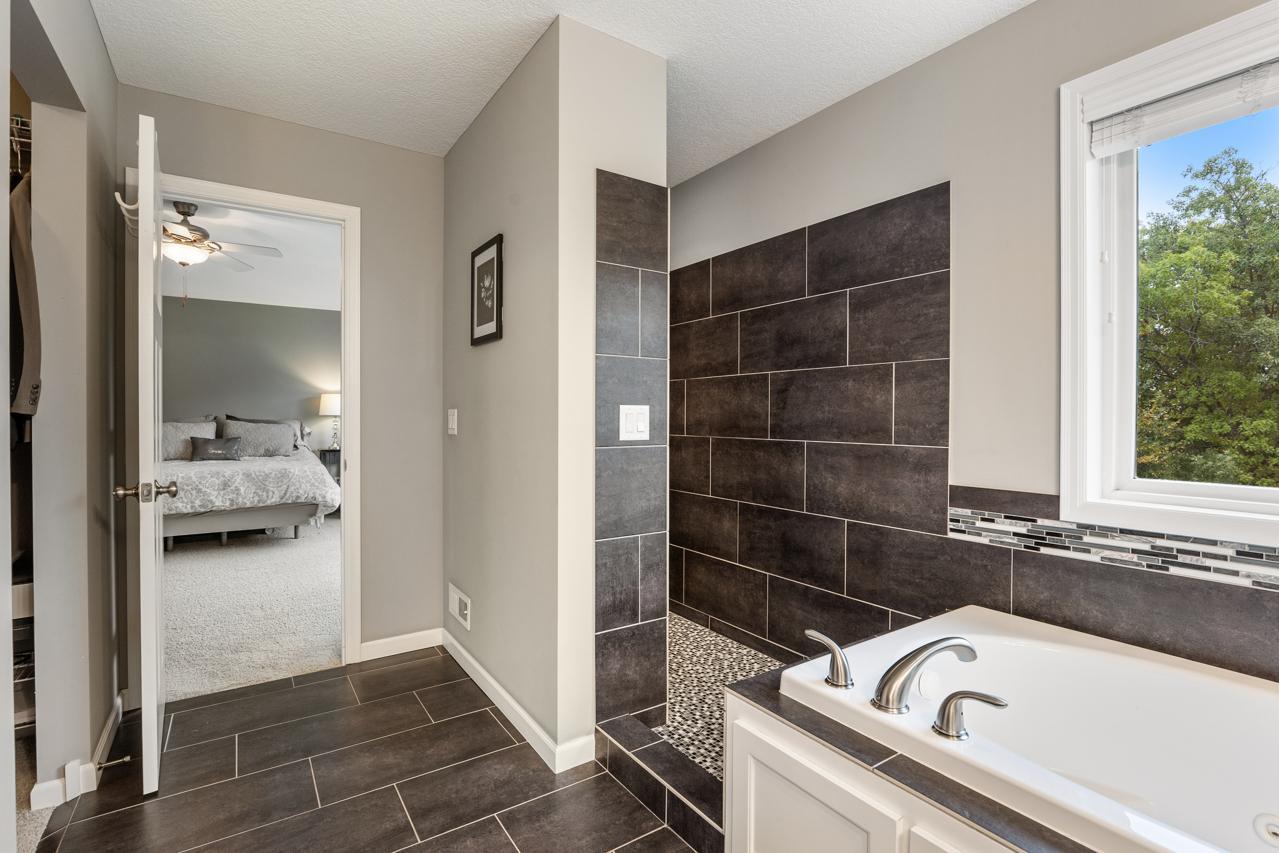 Walk-in shower offering a sleek design and comfortable everyday functionality.