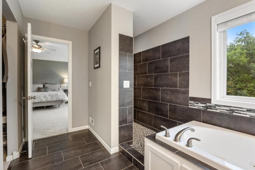 Walk-in shower offering a sleek design and comfortable everyday functionality.