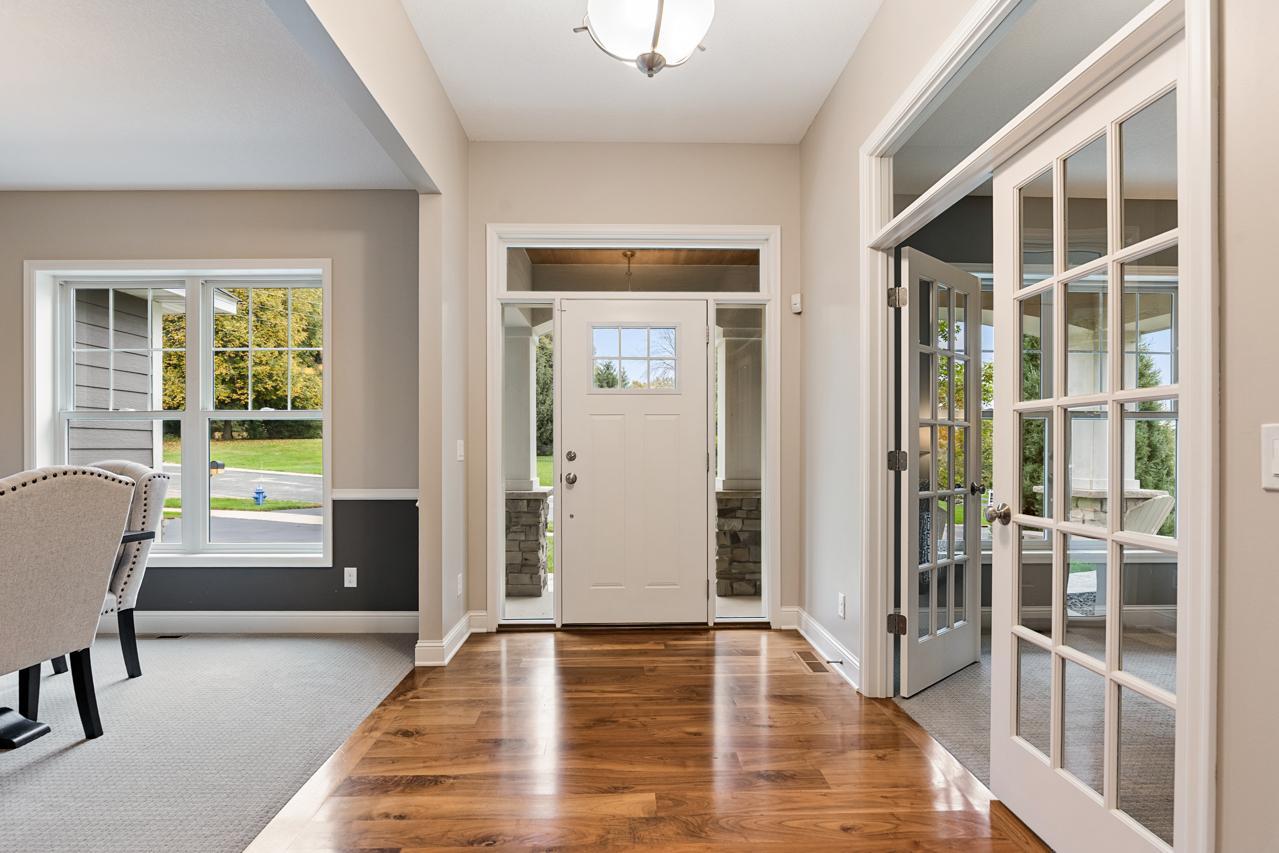 Inviting foyer offering easy access to the front office and a clear, open view into the formal dining room.