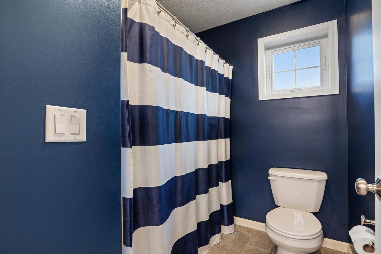 Full Jack-and-Jill bathroom on the upper level, shared between Bedrooms 3 and 4.