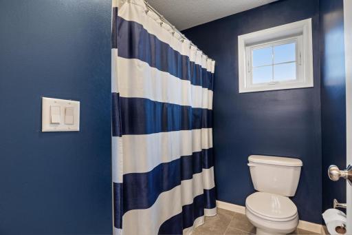 Full Jack-and-Jill bathroom on the upper level, shared between Bedrooms 3 and 4.