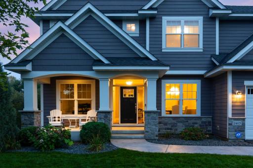 Warm and cozy front porch that creates an inviting entry.
