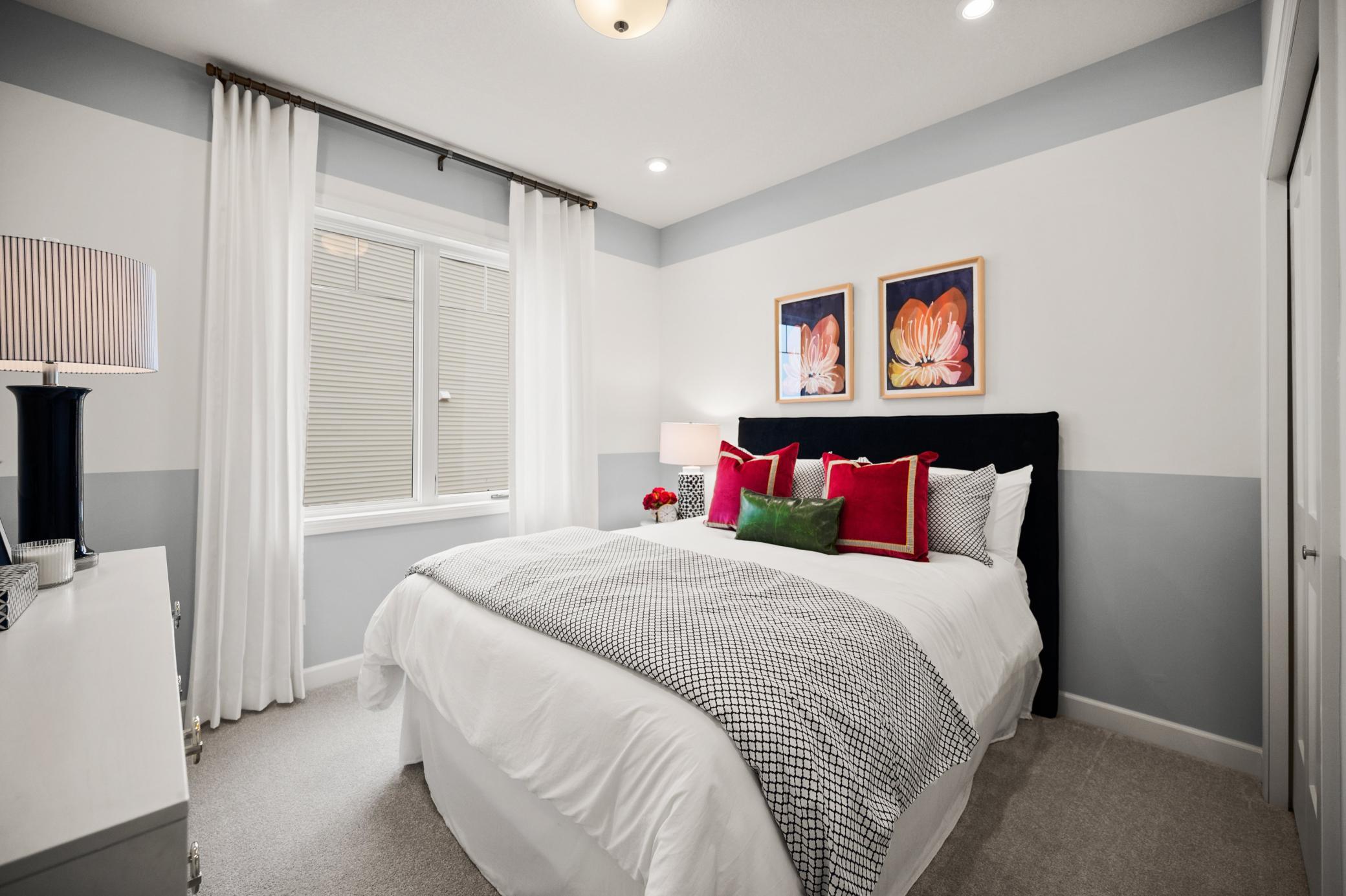 Main level secondary bedroom! *Model home photos, many options to choose on this to be built home.*