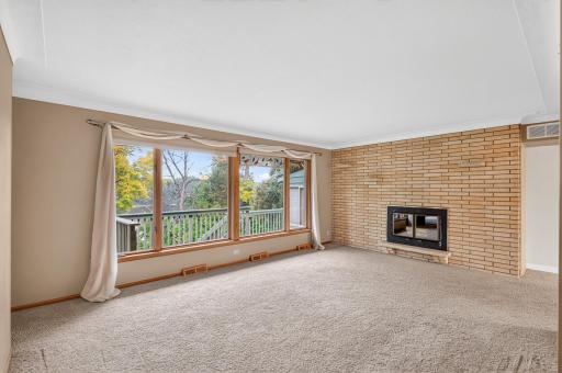 Enjoy the river views from the spacious living room.