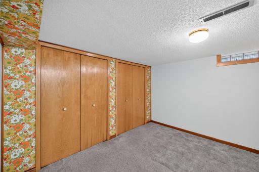 Flex room in the lower level could be a great craft room.
