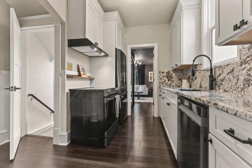 The galley-style layout works especially well here, opening naturally toward the dining room rather than feeling closed off.