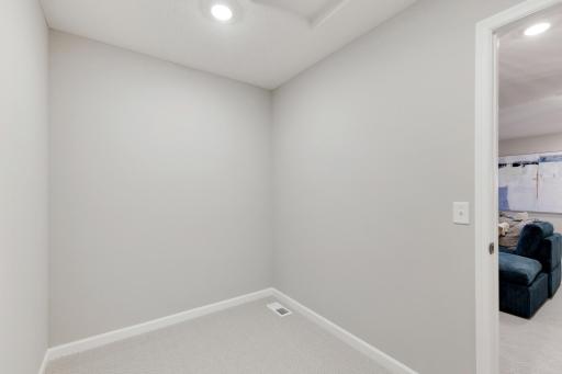 A glimpse of the storage room upstairs as well. *Model home photos, many options to choose on this to be built home.*