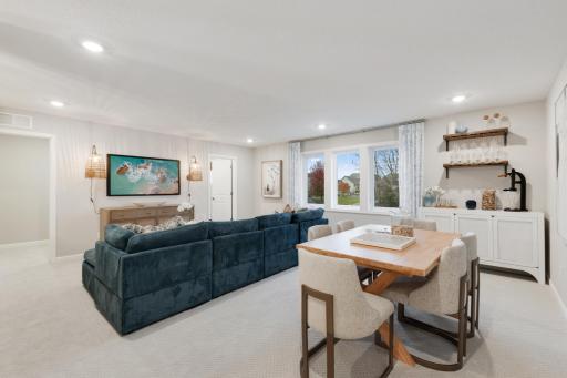 The upper level loft is a great addition to this floor plan. *Model home photos, many options to choose on this to be built home.*