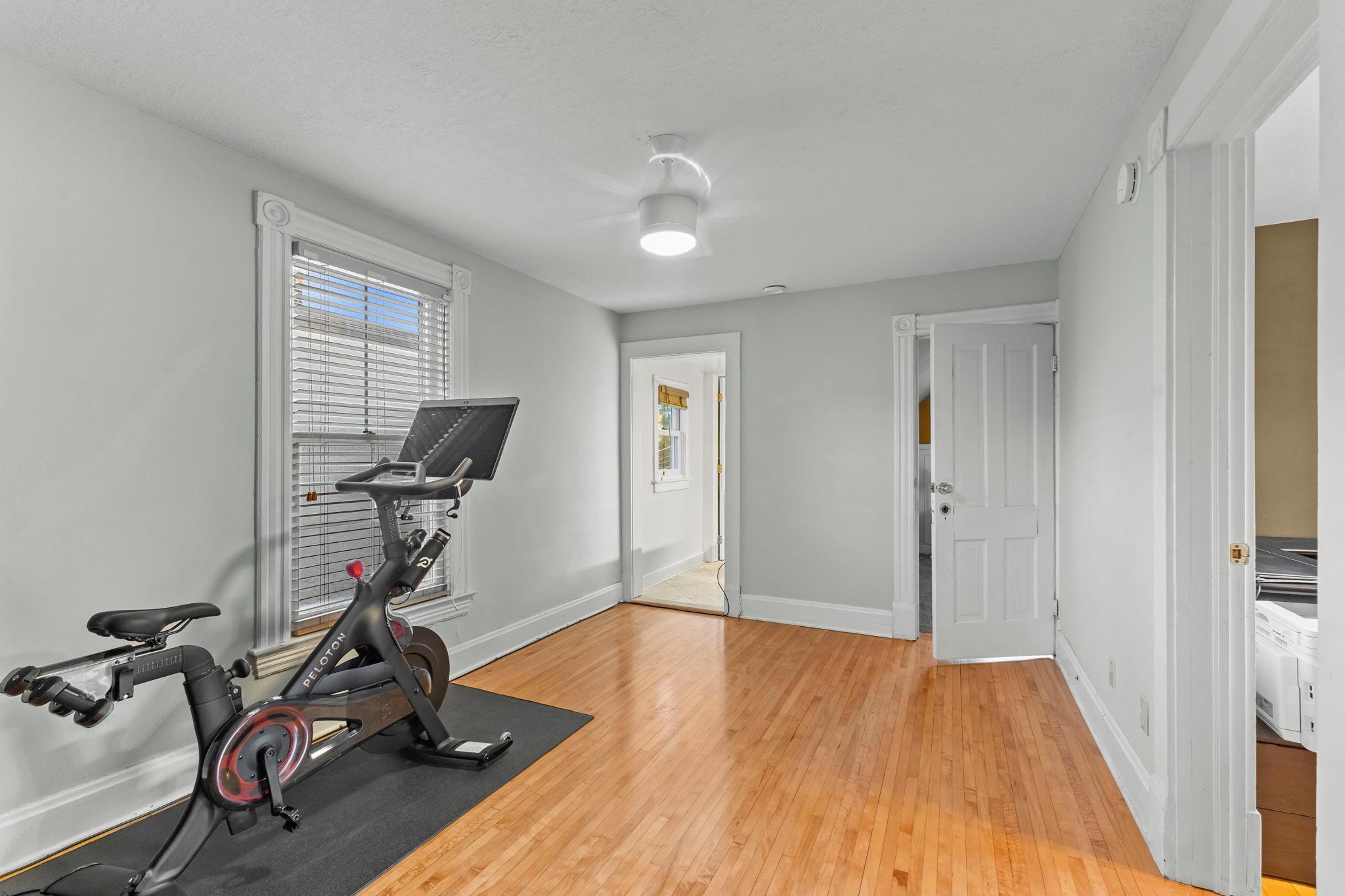 Upper level 14 x 10 Den area currently used as workout room