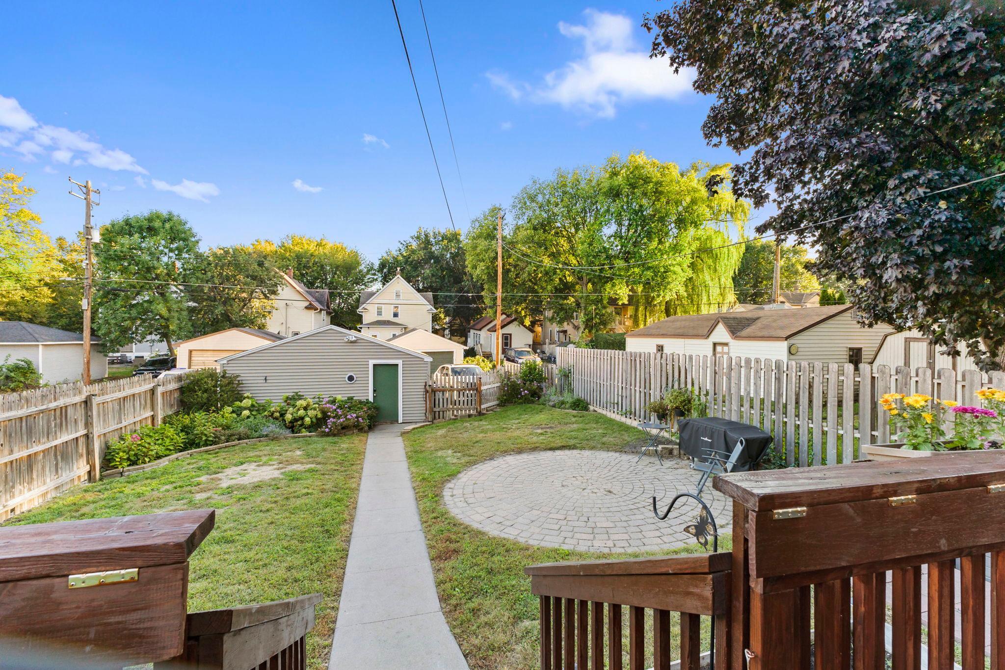 View from the deck overlooking the fully fenced backyard