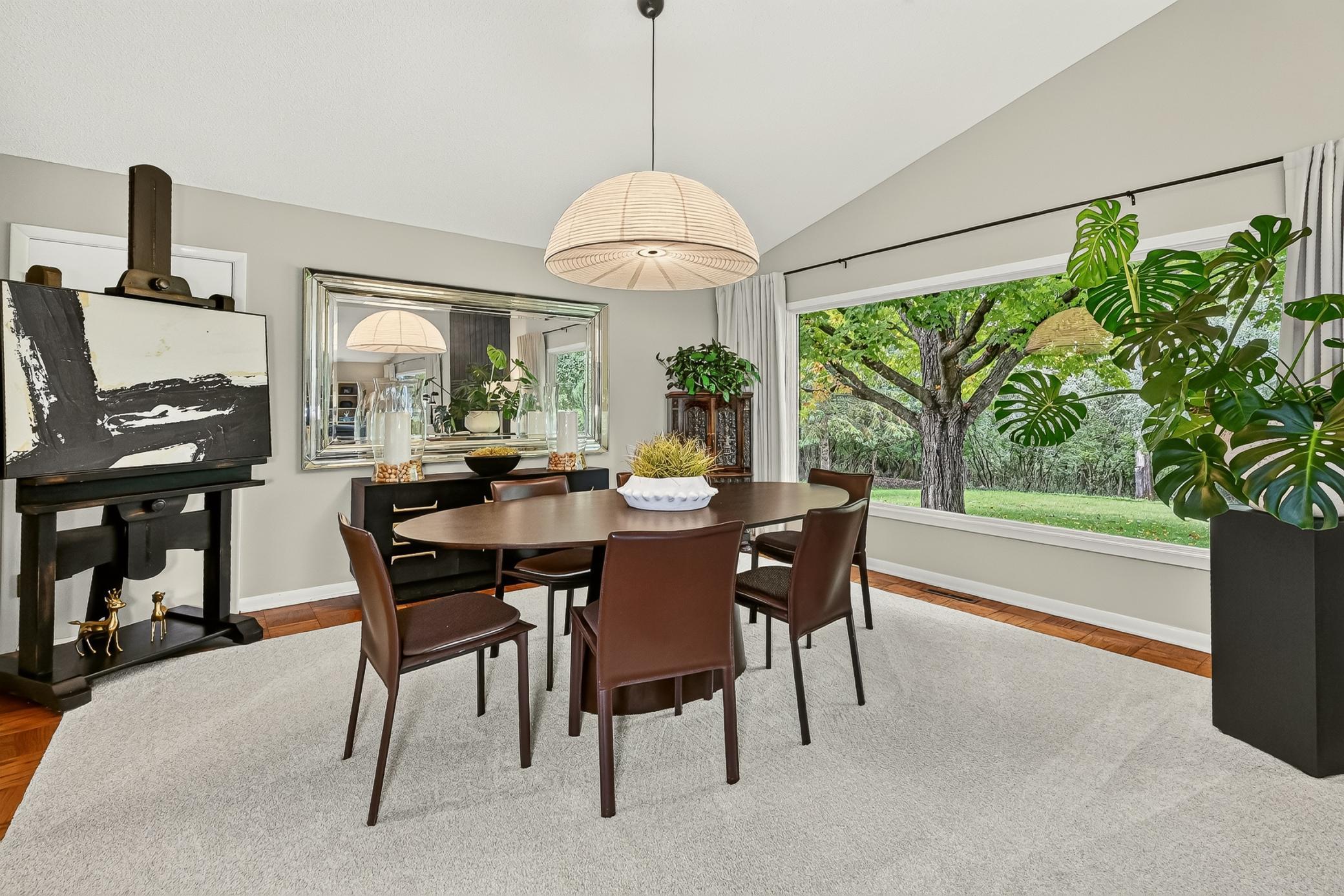 Designed for gathering, the dining room transitions effortlessly from intimate dinners to larger celebrations.